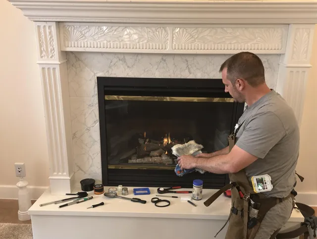 Stamford Chimney Sweep performing fireplace maintenance in Stamford, CT